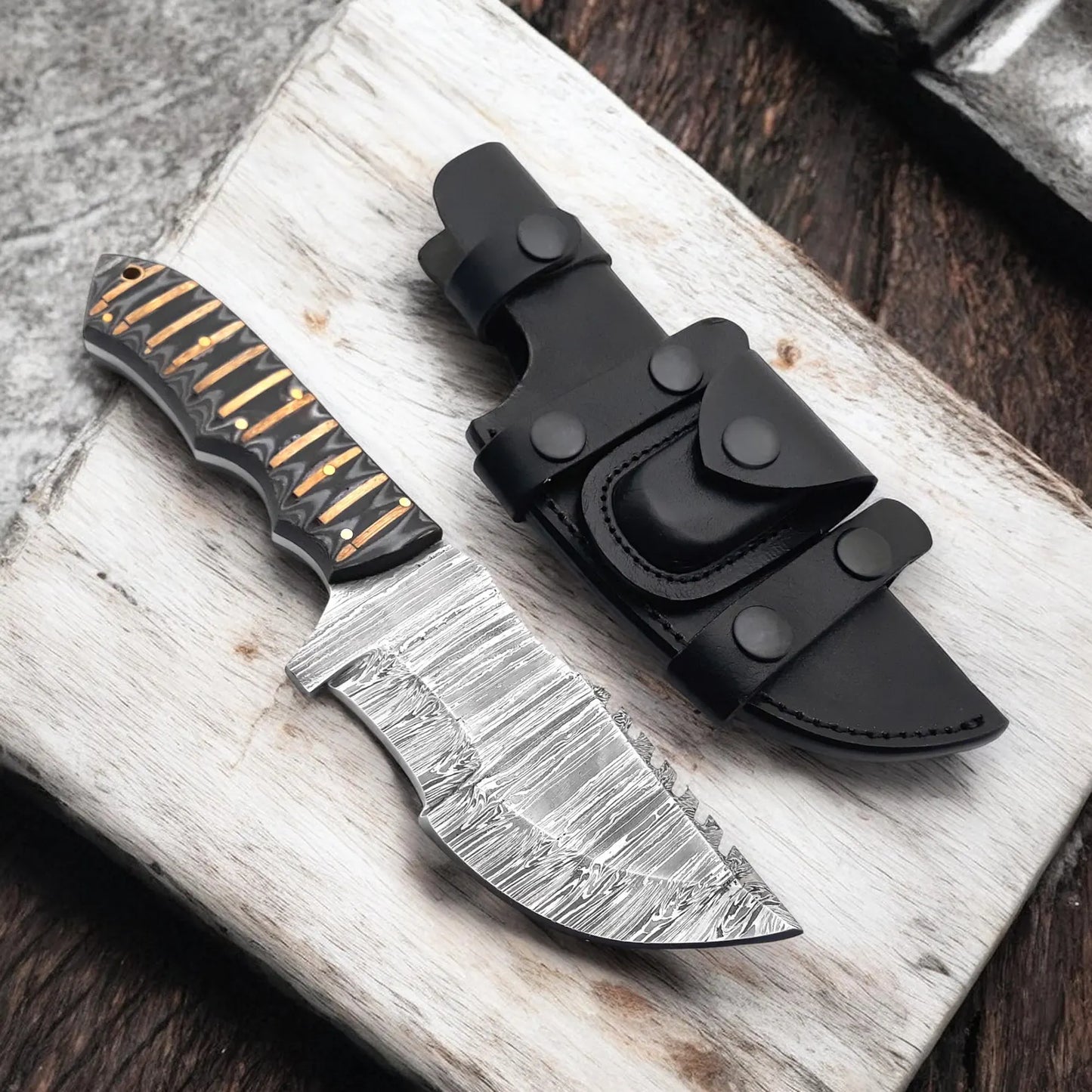 Damascus Steel Tracker Knife with Sculpted Handle and Leather Sheath